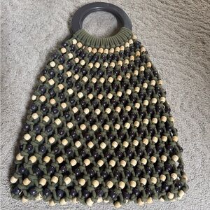 C&C California beaded boho hobo beach bag features a macrame design.